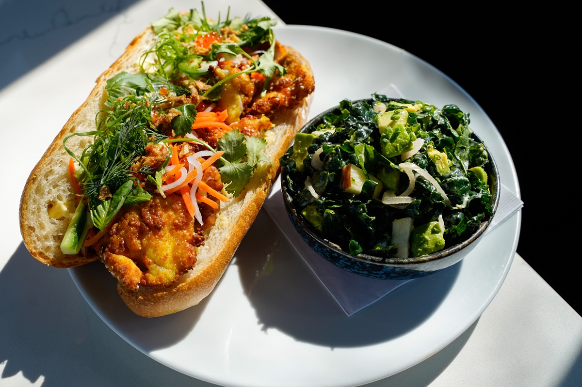 eden's april sandwich collab Fried Whitefish Bánh Mì with Chef Andrew Zimmerman with side salad