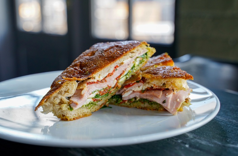 eden's may Chicago sandwich collab with Jacob Saben of Coda di Volpe. A panini Built on Eden’s house made rosemary focaccia