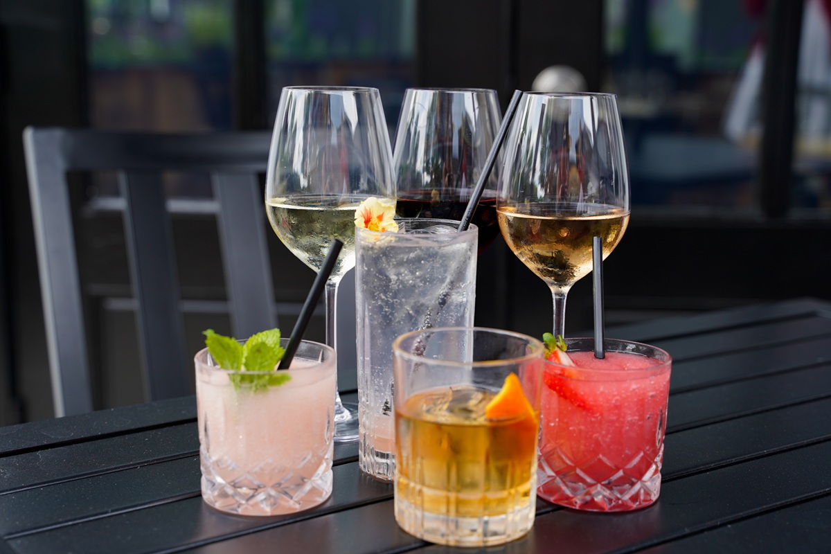 Assortment of cocktails and wine by glass for new happy hour in Chicago this summer at eden